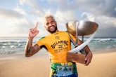 OAHU, UNITED STATES - DECEMBER 19: Italo Ferreira of Brazil winning his maiden WSL World Title at the 2019 Billabong Pipe Masters after winning the final at Pipeline on December 19, 2019 in Oahu, United States. (Photo by Kelly Cestari/WSL via Getty Images)